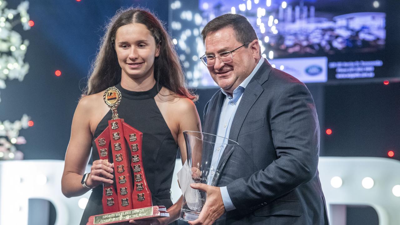 Sienna Deurloo accepts the Junior Sports Star of the Year award from David Russell, Wippells Autos. Sports Darling Downs Sports Stars of the Year dinner. Saturday, February 11, 2023. Picture: Nev Madsen.