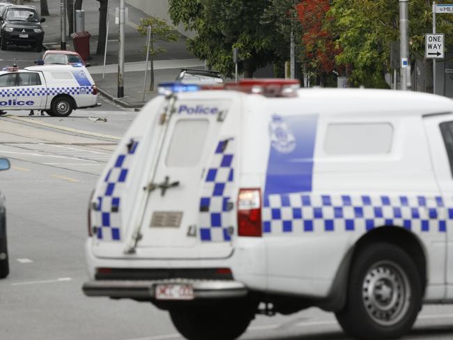 Police incident at the corner of Millers Lane and Park St in South Melbourne. Police vans block off Park St at St Kilda Rd and Kings Way.