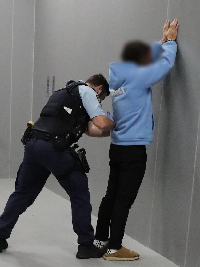 The A-League players being arrested on Friday.