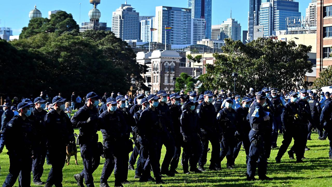 Police confront thousands of protesters during the anti-lockdown rally in Sydney. Picture: Steven SAPHORE/ AFP