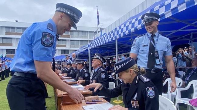 Senior Sergeant Angelique Maloney was the table officer when her youngest son, Josh Munckton, was sworn in. Her elder son, Matt Munckton, stands in the background. Picture: supplied.