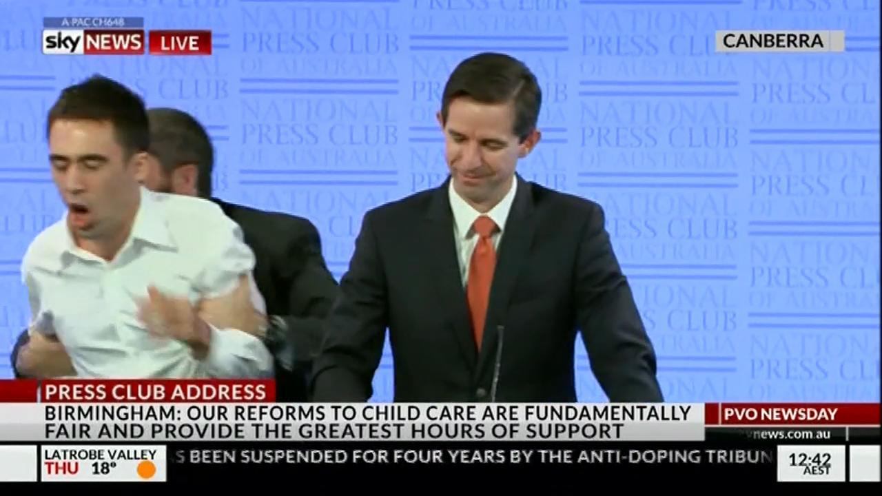 Protest interrupts Simon Birmingham's Press Club address