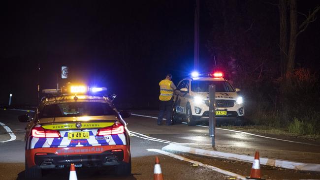 Campbelltown Rd, Denham Court was cordoned off on Friday night. Picture: Gordon McComiskie