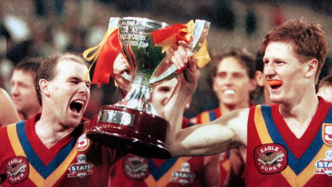 South Australia’s Andrew Jarman and Ben Hart after winning the State-of-Origin match against Victoria at the MCG in 1993. Picture: Ray Titus