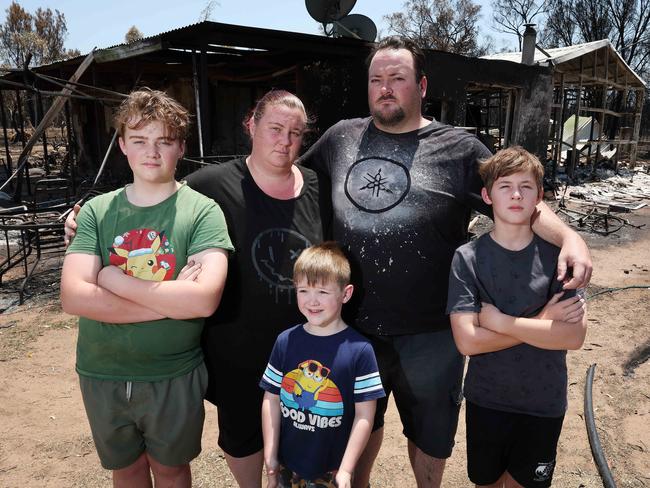 Sarah and Graham Windsor with children Kyle, 12, Alex, 11, and Dean, 5. Picture: Liam Kidston