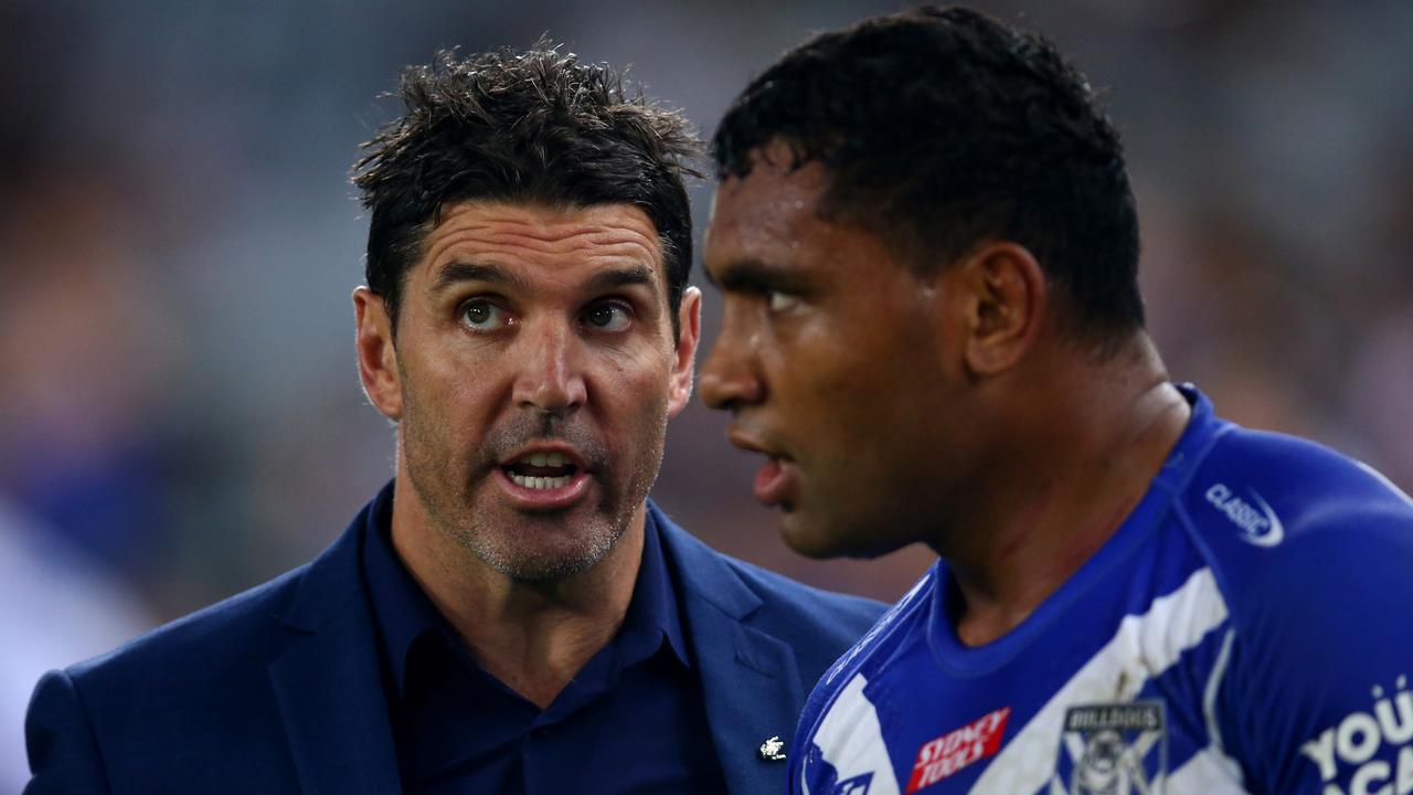 SYDNEY, AUSTRALIA - APRIL 30: Bulldogs coach Trent Barrett talks to Tevita Pangai Junior of the Bulldogs during the round eight NRL match between the Canterbury Bulldogs and the Sydney Roosters at Stadium Australia on April 30, 2022 in Sydney, Australia. (Photo by Jason McCawley/Getty Images)