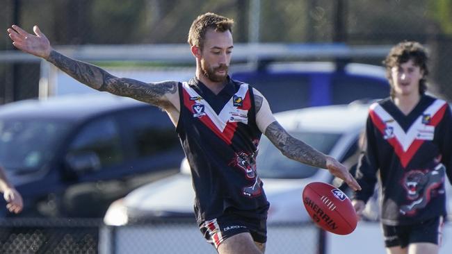 MPFNL: Joshua Stewart gets a kick for Devon Meadows. Picture: Valeriu Campan