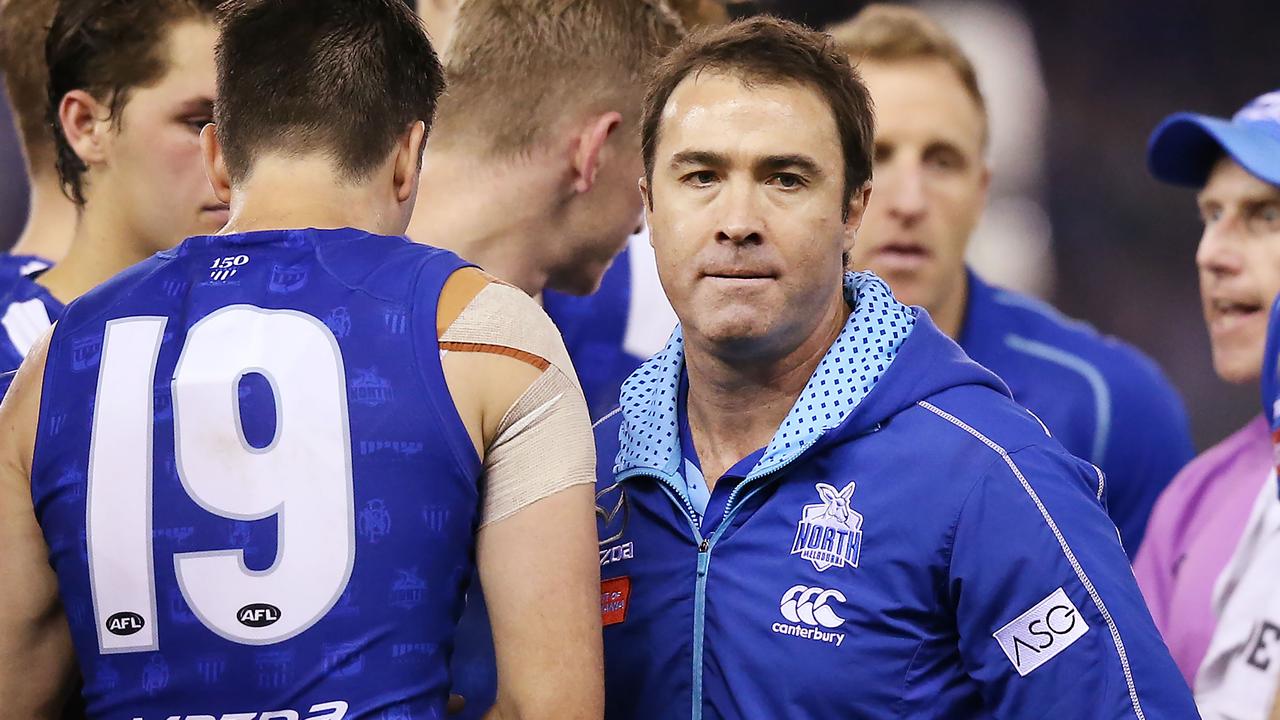 Kangaroos head coach Brad Scott walks off after speaking at at three quarter time during the round eight AFL match between the North Melbourne Kangaroos and the Geelong Cats at Marvel Stadium on May 12, 2019 in Melbourne, Australia. (Photo by Michael Dodge/Getty Images)