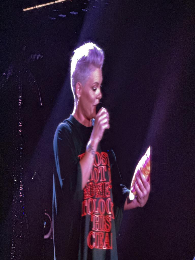 P!nk inspecting her new gift from a Brisbane fan. Photo: Georgia Clelland.