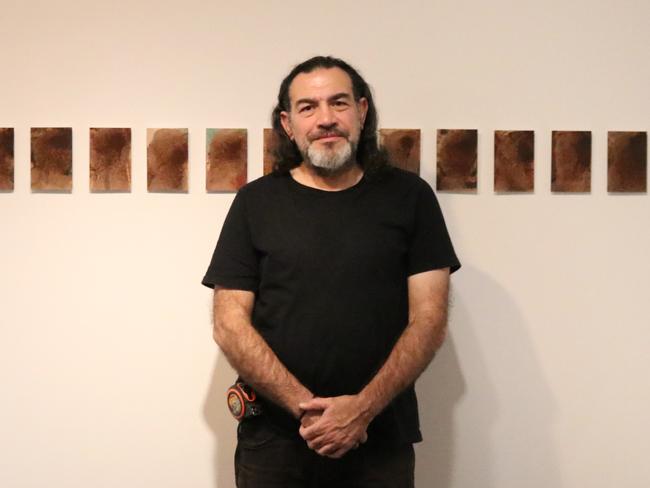 Khaled Sabsabi with his works at Mosman Art Gallery