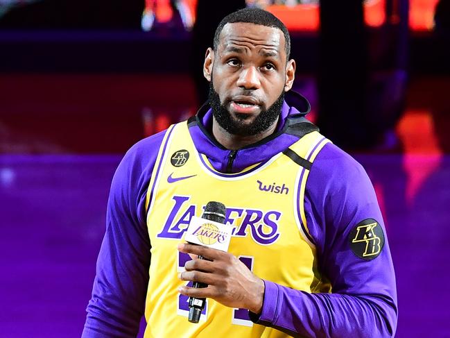 Los Angeles Lakers player LeBron James speaks from centre court in honour of NBA legend Kobe Bryant ahead of a game at the Staples Center in Los Angeles. Picture: AFP