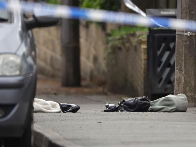 A handbag and shoes lie on the ground as police cordon off an area after Jo Cox, 41, Labour MP for Batley and Spen, was shot and stabbed by an attacker. Picture: Getty