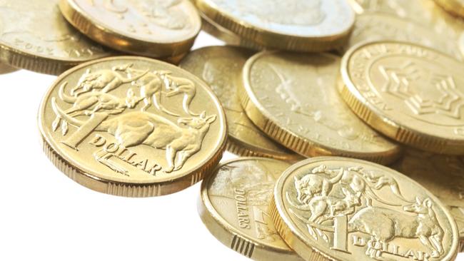 "Australian one dollar and two dollar coins, in macro."