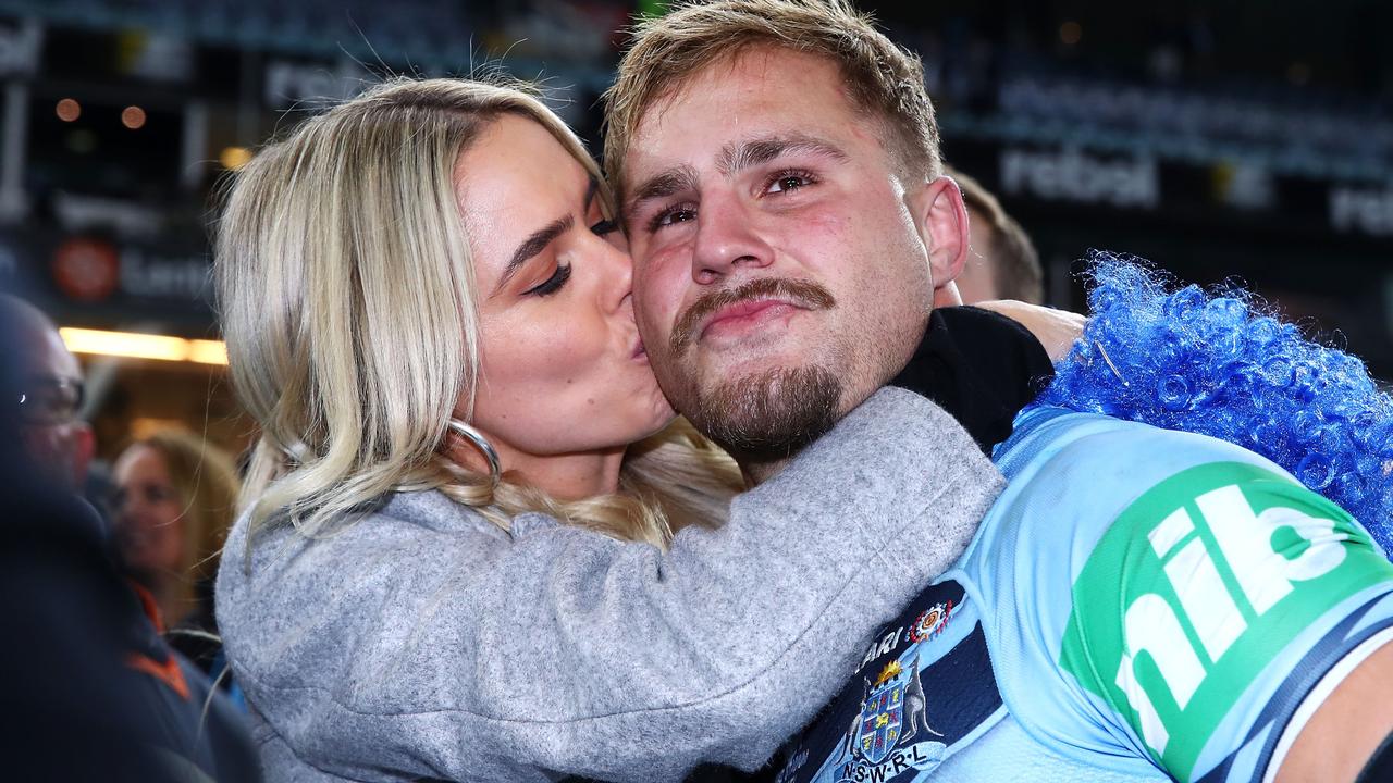 De Belin with partner Alyce Taylor after winning Origin.