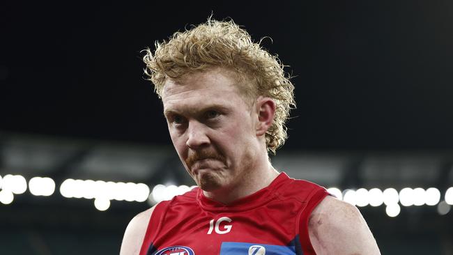 MELBOURNE, AUSTRALIA - JULY 27: Clayton Oliver of the Demons looks dejected after the round 20 AFL match between Melbourne Demons and Greater Western Sydney Giants at Melbourne Cricket Ground, on July 27, 2024, in Melbourne, Australia. (Photo by Daniel Pockett/Getty Images)