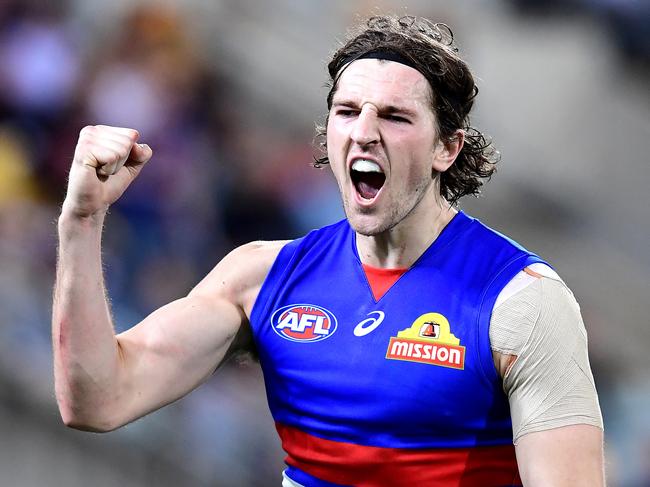 BRISBANE, AUSTRALIA - AUGUST 04: Marcus Bontempelli of the Bulldogs celebrates kicking a goal during the round 20 AFL match between the Brisbane Lions and the Western Bulldogs at The Gabba on August 04, 2019 in Brisbane, Australia. (Photo by Bradley Kanaris/AFL Photos via Getty Images )