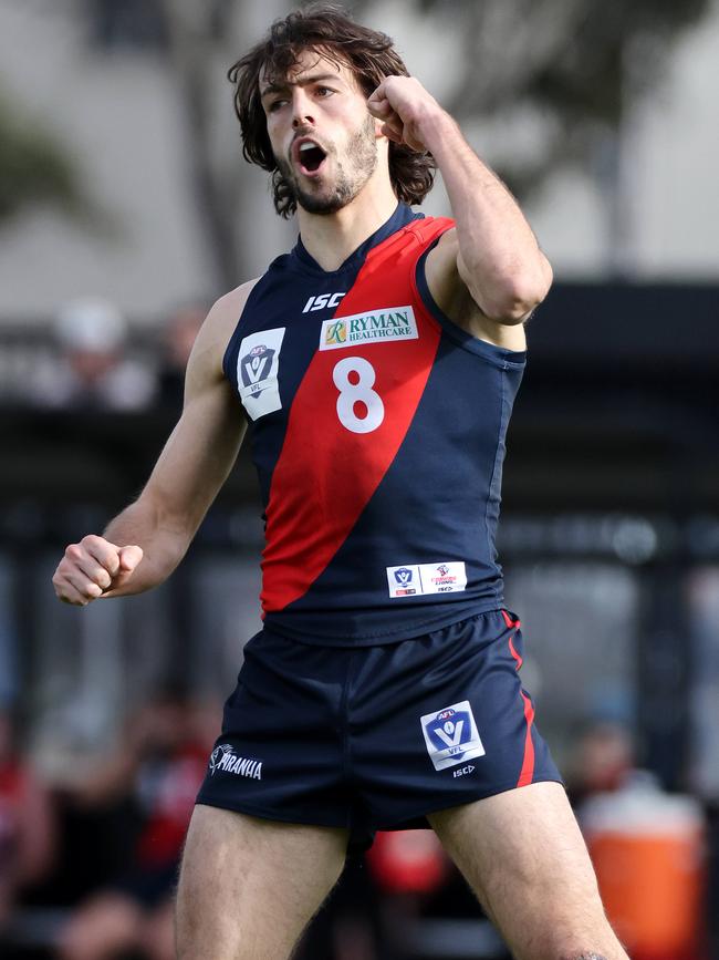 Tom Silvestro celebrates a goal for Coburg. Picture: George Salpigtidis