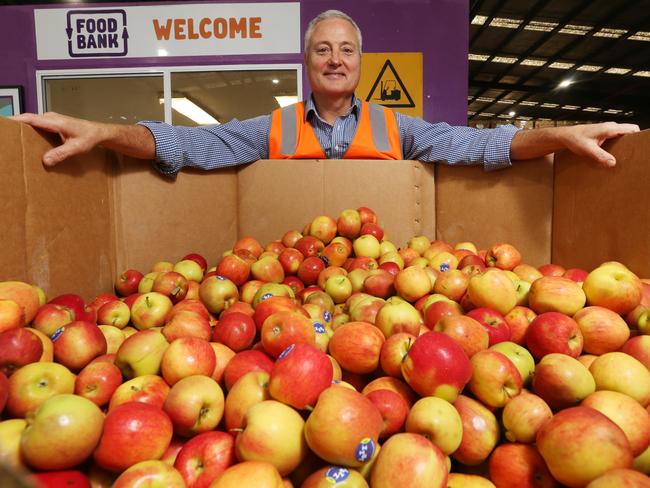 Photo of Foodbank CEO Dave McNamara at Their Yarraville wharehouse For a story about Foodbank's involvement with the Feed Melbourne Appeal.Dave McNamara pictured with fresh fruit/vegies.  Picture: Mark Wilson