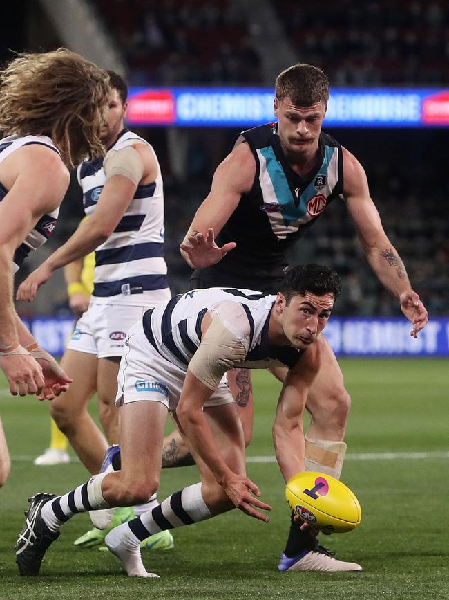 Simpson fires out a handball last year. Picture: Sarah Reed/AFL Photos via Getty Images