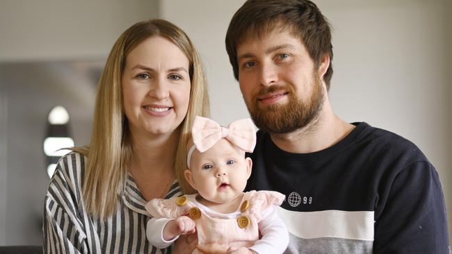 Brittany Harvey and husband Gered with baby Halle at home. Picture: NCA NewsWire / David Mariuz