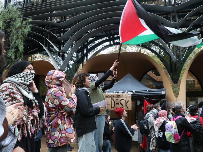 MELBOURNE, AUSTRALIA - NewsWire Photos, MAY 17, 2024. Pro Palestine protesters continue to occupy the Arts Building at Melbourne University. Students gather to listen to a press conference outside the building.  Picture: NewsWire / David Crosling