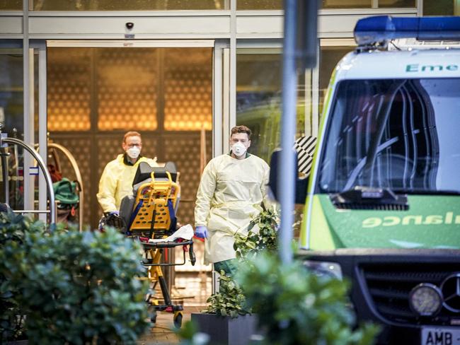 A patient leaving the Pullman Hotel, which was the first medi-hotel launched in South Australia. Picture: Mike Burton