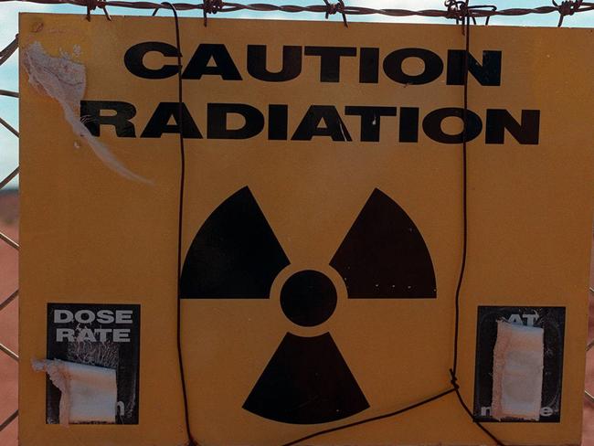 13 Jul 1996 Taranaki Nuclear test site, Maralinga. PicBrenton/Edwards. contamination environmental pollution radiation emblem logo outback SA signs caution warning danger barbed wire logos