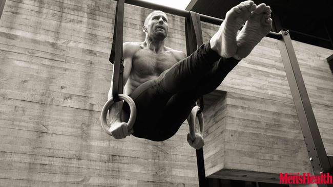 Demonstrating a classic L-sit. Picture: Daniel Smith for Men’s Health