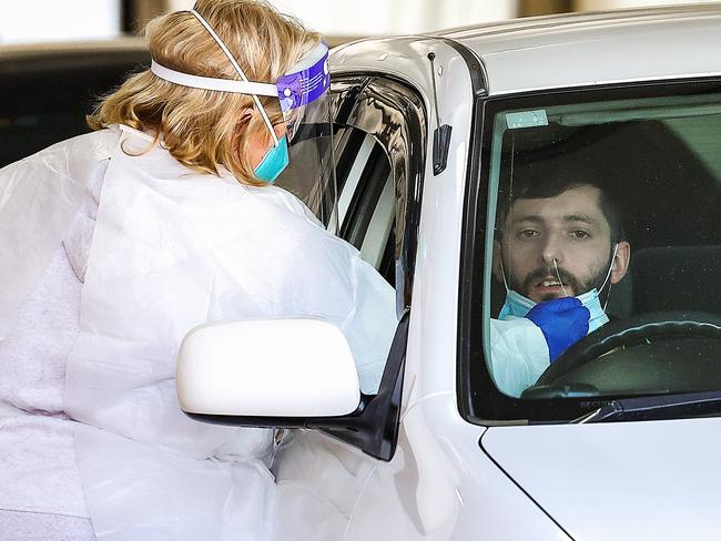 MELBOURNE, AUSTRALIA - NewsWire Photos 14 SEPTEMBER 2021 : Covid-19 cases across Melbourne's Northern and  Western suburbs are on the rise. A man gets a Covid-19 test at a site in Broadmeadows. Picture : NCA NewsWire / Ian Currie