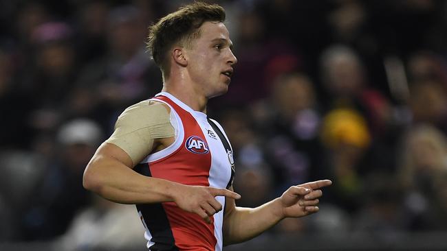 Jack Billings kicks a goal against Carlton.