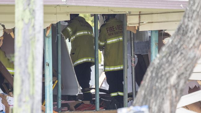 Investigators inside the wrecked house on Monfarville St, St Marys. Picture: NCA NewsWire / Monique Harmer