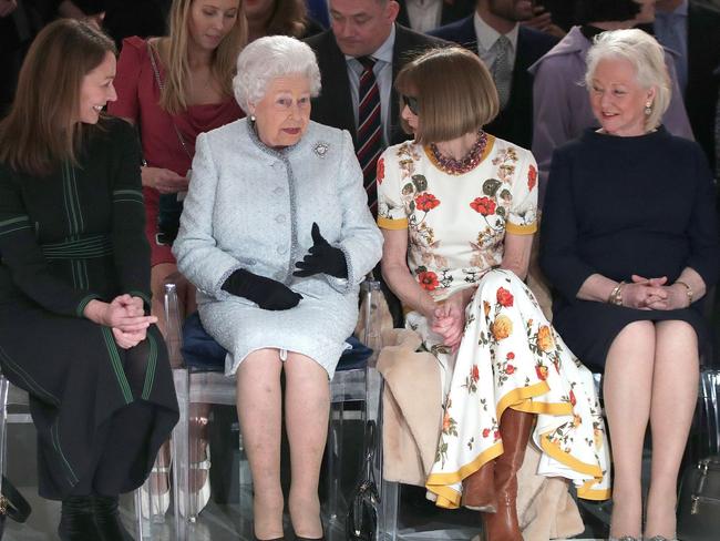 Britain's Queen Elizabeth II, accompanied by Chief Executive of the British Fashion Council Caroline Rush (L), Anna Wintour and royal dressmaker Angela Kelly at London Fashion Week's BFC Show Space in 2018. Picture: AFP