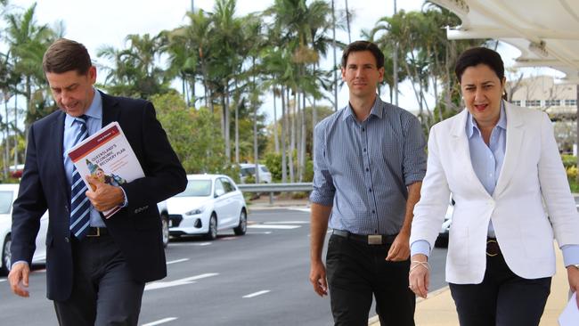 Treasurer Cameron Dick, Labor candidate Tom Smith and Premier Annastacia Palaszczuk.