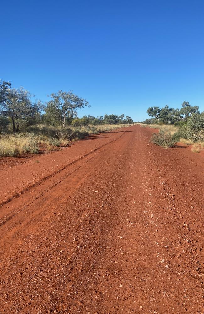 The red-dirt road that leads to Singleton Station.