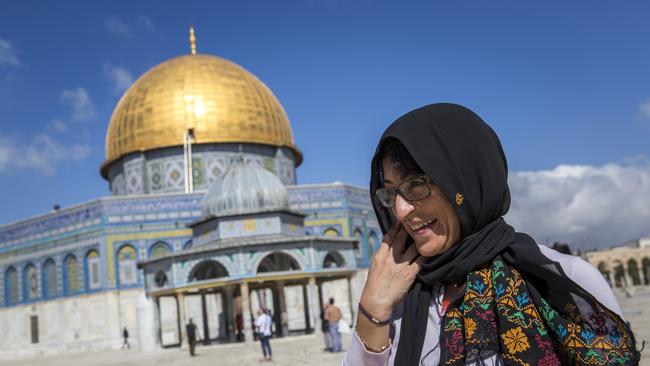 Susan Abulhawa, a Palestinian-American writer and human rights activist, near the Dome of the Rock Islamic shrine while travelling with the 2014 Palestine Festival of Literature in 2014 in Jerusalem. (Photo by Rob Stothard/Getty Images)