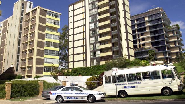 Police in the area around the St Lucia unit where Joan Pitt was murdered in 2004. Picture: Lyndon Mechielsen