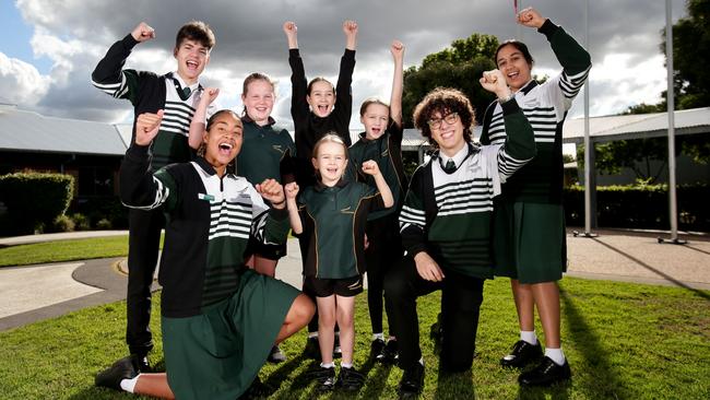 Students from Ash Barty’s former school Woodcrest State College in Springfield celebrate after her Wimbledon win this month. Photo: Steve Pohlner