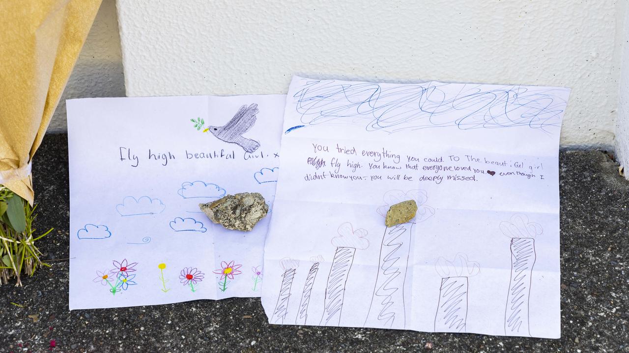 Tributes at the scene of the fatal fire where eight-year-old Raven Contini lost her life. Picture: Richard Walker