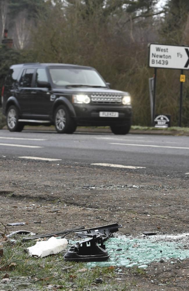 Broken glass and car parts on the road side near to the Sandringham Estate, England, where Prince Philip was involved in a car accident. Picture: AP
