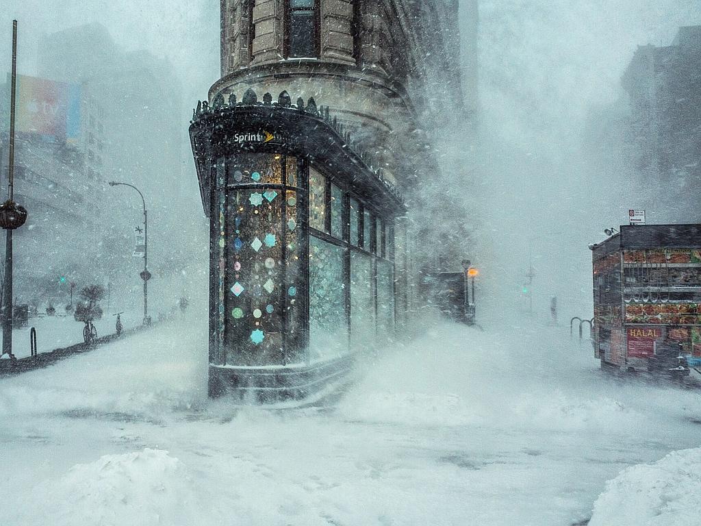 ‘Jonas Blizzard and the Flatiron Building’ by Michele Palazzo.... Location: New York City, United States. Picture: 2016 National Geographic Travel Photographer of the Year Contest