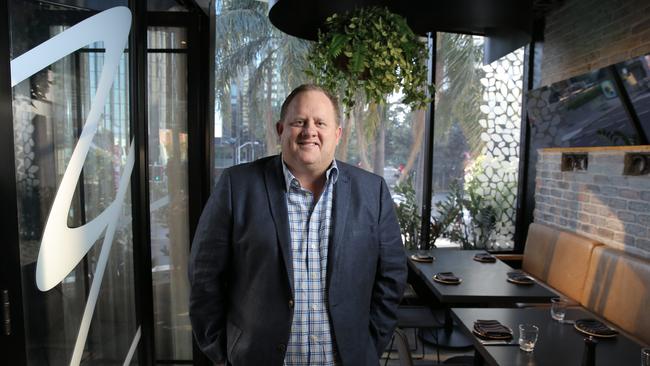 Tech millionaire Bevan Slattery at Eagle Street Brisbane. Pic Mark Cranitch