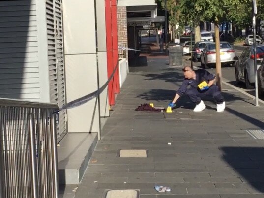 Police have established a crime scene on Crown Street after a man was seriously injured in a brawl.