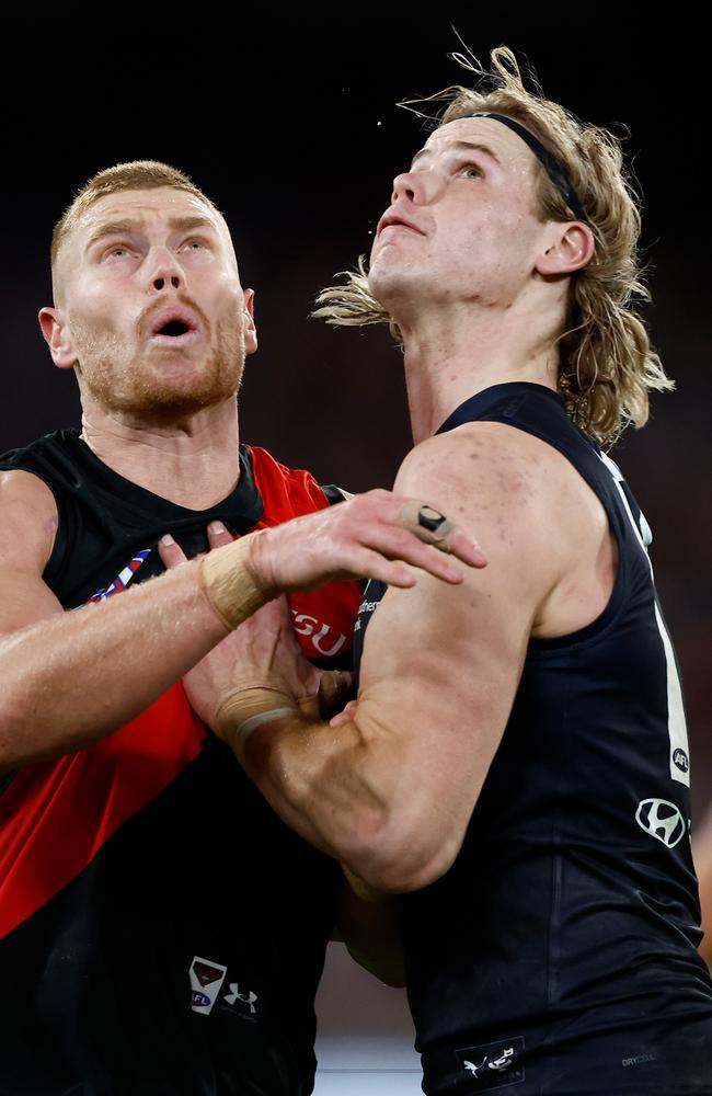 Tom De Koning grapples with Essendon’s Peter Wright during his career-best game at the MCG in the week before their bye. Picture: Michael Willson/AFL Photos via Getty Images.