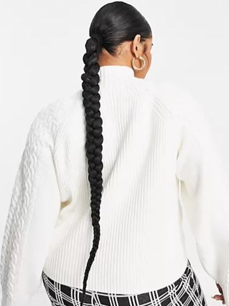 ASOS DESIGN Curve high neck cable jumper with wide sleeves. Picture: ASOS.