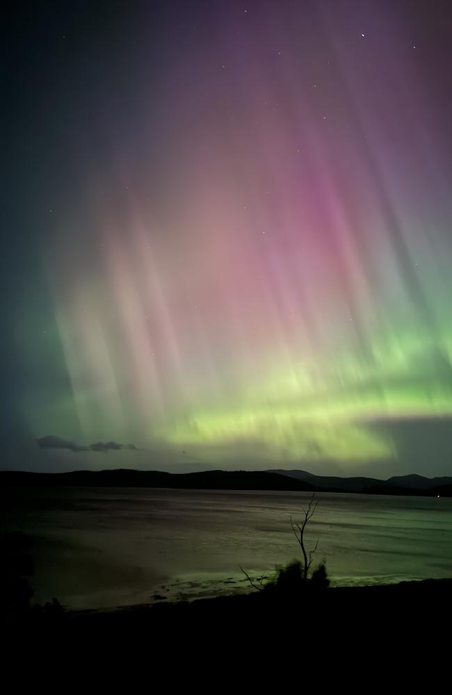 Photos of Aurora Australis taken across Tasmania. Boomer Bay looking southeast. Picture: Bruce Levett