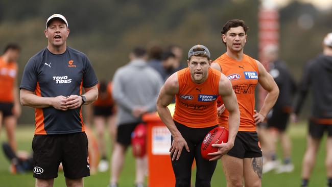 Steve Johnson, pictured left with Jacob Hopper and Tim Taranto, parted ways with the Giants this week. Picture: Phil Hillyard