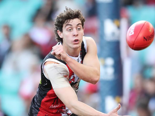 SYDNEY, AUSTRALIA - JUNE 05: Nick Coffield of the Saints handballs during the round 12 AFL match between the St Kilda Saints and the Sydney Swans at Sydney Cricket Ground on June 05, 2021 in Sydney, Australia. (Photo by Matt King/AFL Photos/via Getty Images)