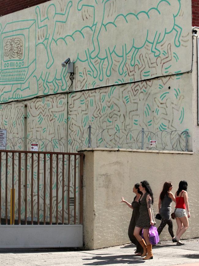 Keith Haring’s mural on the wall of the former Collingwood Technical School in Melbourne.