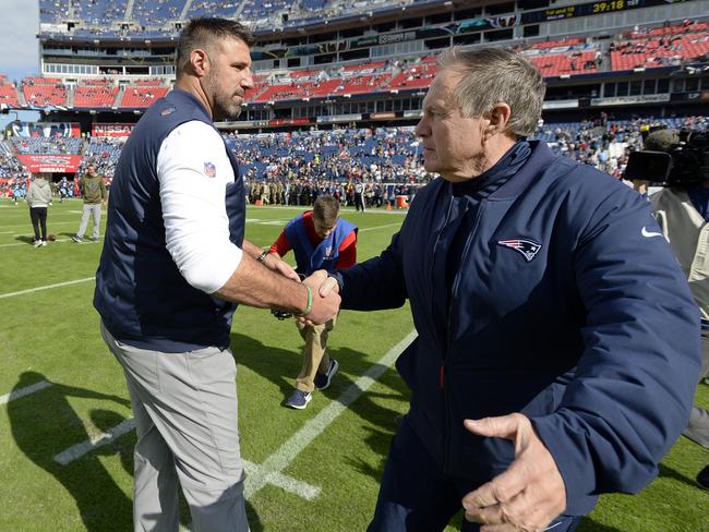 Tennessee Titans head coach Mike Vrabel, left, greets New England Patriots head coach Bill Belichick before an NFL football game Sunday, Nov. 11, 2018, in Nashville, Tenn. (AP Photo/Mark Zaleski)