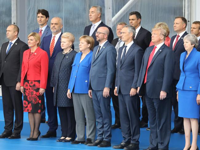 NATO heads of state pose for a ‘family picture’ ahead of the opening ceremony of the NATO summit. While the rest of the leaders arrived together, Mr Trump and Mr Erdogan trailed behind. Picture: AFP